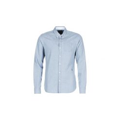 Koszule z długim rękawem Scotch Soda STUTU. Niebieskie koszule męskie marki Scotch & Soda, s, bez wzorów, bez kołnierzyka, z długim rękawem. Za 319,20 zł.