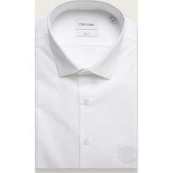 Calvin Klein - Koszula. Białe koszule męskie Calvin Klein, bez wzorów, z elastanu, eleganckie, z włoskim kołnierzykiem, z długim rękawem. Za 349,90 zł.
