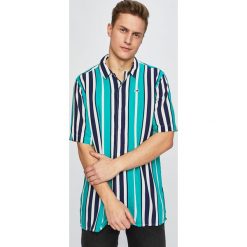 Tommy Jeans - Koszula. Zielone koszule męskie Tommy Jeans, s, bez wzorów, z wiskozy, klasyczne, z klasycznym kołnierzykiem, z krótkim rękawem. W wyprzedaży za 199,90 zł.
