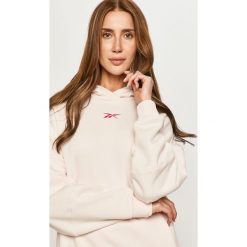 Reebok - Bluza. Różowe bluzy damskie Reebok, s, bez wzorów, z bawełny, z długim rękawem, długie, z kapturem. Za 229,90 zł.