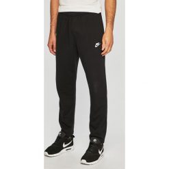Nike Sportswear - Spodnie. Czarne spodnie męskie Nike Sportswear, m, bez wzorów, z bawełny. Za 159,90 zł.