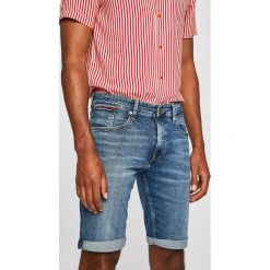 Tommy Jeans - Szorty jeansowe. Niebieskie spodenki i szorty męskie Tommy Jeans, z aplikacjami, z elastanu, casualowe. Za 299,90 zł.