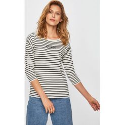 Guess Jeans - Sweter. Białe swetry damskie Guess Jeans, s, z nadrukiem, z wiskozy, bez rękawów, bez kaptura. W wyprzedaży za 219,90 zł.