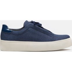Granatowe sneakersy damskie. Niebieskie buty sportowe damskie marki Kazar, bez wzorów, z jeansu, sportowe, trekkingowe. Za 349,00 zł.