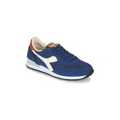 Buty Diadora CAMARO. Niebieskie trampki i tenisówki damskie Diadora, bez wzorów, bez zapięcia. Za 279,20 zł.