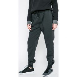 Under Armour - Spodnie Threadborne Stacked Jogger. Szare joggery męskie marki Under Armour, xl, z bawełny. W wyprzedaży za 219,90 zł.
