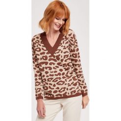 Sweter w kolorze beżowo-brązowym ze wzorem. Pomarańczowe swetry damskie ZOCHA, l. W wyprzedaży za 179,95 zł.