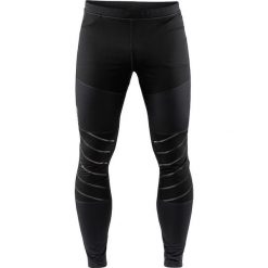 Legginsy Craft Warm Train Wind Tights M Czarne. Czarne spodnie męskie Craft, na zimę, m, bez wzorów, z poliesteru, do biegania. Za 194,99 zł.