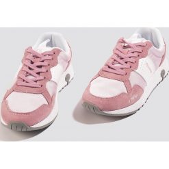 Champion Buty sportowe VX Trainer Low Cut - Pink. Różowe buty sportowe damskie marki Champion, z gumy. Za 330,95 zł.