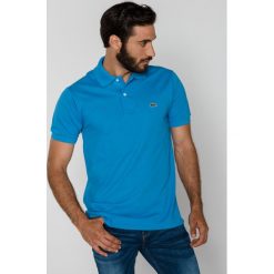 Lacoste Polo Koszulka Niebieski. Niebieskie podkoszulki męskie Lacoste, l, bez wzorów, z bawełny, bez rękawów. Za 421,95 zł.