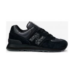 New Balance 574 Tenisówki Czarny. Czarne trampki i tenisówki damskie New Balance, bez wzorów, ze skóry, bez zapięcia. Za 430,95 zł.