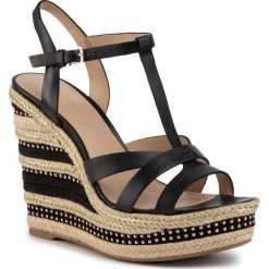 Espadryle ALDO - Nydaycia 63487450 043. Czarne espadryle damskie ALDO, z aplikacjami, ze skóry ekologicznej, bez obcasa, na obcasie. W wyprzedaży za 279,00 zł.