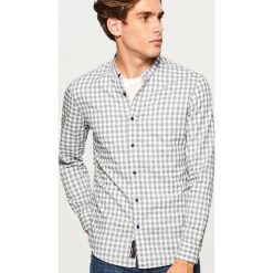 Koszula slim fit z bawełny organicznej - Niebieski. Niebieskie koszule męskie slim Reserved, l, z bawełny. Za 99,99 zł.