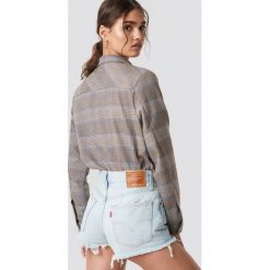 Levi's Szorty 501 - Blue. Niebieskie bermudy damskie Levi's®, z bawełny. Za 181,95 zł.