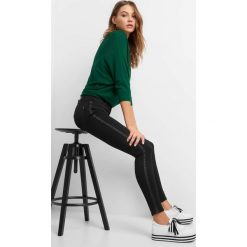 Spodnie skinny z lampasami. Czarne rurki damskie marki Orsay, s, z elastanu. Za 79,99 zł.