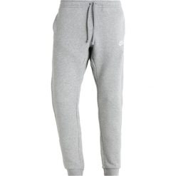 Nike Sportswear CLUB Spodnie treningowe grey. Szare spodnie męskie marki Nike Sportswear, xxl, bez wzorów, z bawełny. Za 379,00 zł.