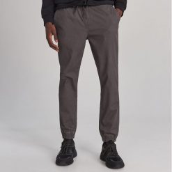 Spodnie jogger - Szary. Szare spodnie męskie Reserved, m, bez wzorów. Za 129,99 zł.
