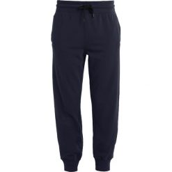 Spodnie dresowe damskie: Ivy Park LOGO JOGGER Spodnie treningowe rainstorm