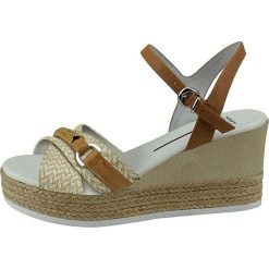 U.S. POLO ASSN. sandały damskie Madeira 1 37 beżowe. Brązowe koturny damskie U.S. Polo Assn., bez obcasa, na koturnie, bez zapięcia. Za 389,00 zł.