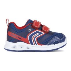Geox Tenisówki Chłopięce Dakin 23 Niebieski. Niebieskie buty chłopięce sportowe Geox, bez wzorów, sportowe, bez zapięcia. W wyprzedaży za 205,00 zł.