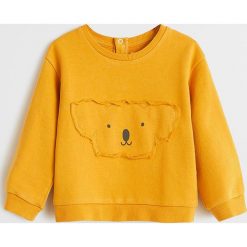 Mango Kids - Bluza dziecięca Osito 62-80 cm. Żółte bluzy dziewczęce Mango Kids, z nadrukiem, z bawełny, bez rękawów, bez kaptura. Za 59,90 zł.