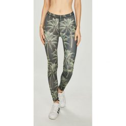 Femi Stories - Legginsy. Żółte spodnie damskie marki Femi Stories, s, z elastanu. W wyprzedaży za 129,90 zł.