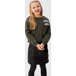 Mango Kids - Bluza dziecięca Grunge 110-164 cm. Żółte bluzy dziewczęce z aplikacjami, z bawełny. Za 69,90 zł.