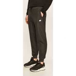 New Balance - Spodnie. Czarne spodnie męskie New Balance, na co dzień, s, bez wzorów, z poliesteru. Za 299,90 zł.