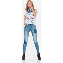 SPODNIE DŁUGIE DAMSKIE, JEANSY RURKI Z ŁATAMI. Niebieskie jeansy damskie Top Secret, s, z jeansu. W wyprzedaży za 69,99 zł.