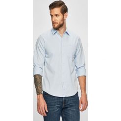 Calvin Klein Jeans - Koszula. Niebieskie koszule męskie Calvin Klein Jeans, m, bez wzorów, z bawełny, klasyczne, z klasycznym kołnierzykiem, z długim rękawem. W wyprzedaży za 239,90 zł.