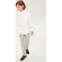Spodnie chino - Jasny szar. Szare spodnie damskie Reserved, m, bez wzorów. Za 99,99 zł.