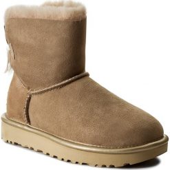 Buty UGG - W Mini Bailey Bow II Metallic 1019032 W/Dri. Brązowe kozaki damskie skórzane marki Ugg. Za 859,00 zł.