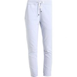 Spodnie sportowe damskie: Juvia Spodnie treningowe light blue