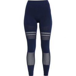 Adidas by Stella McCartney Legginsy night indigo. Niebieskie legginsy marki adidas by Stella McCartney, m, z elastanu. Za 499,00 zł.