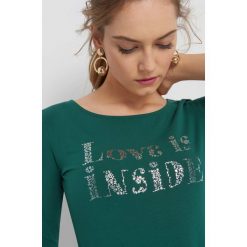 Koszulka z metalicznym napisem. Żółte t-shirty damskie Orsay, xs, z napisami, z bawełny. W wyprzedaży za 30,00 zł.