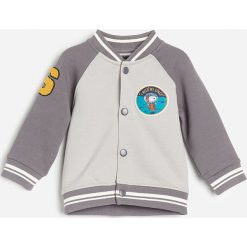 Rozpinana bluza Snoopy -. Bluzy męskie Reserved, bez wzorów, bez kołnierzyka, bez rękawów, bez kaptura. Za 59,99 zł.