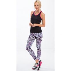 Fioletowe legginsy sportowe w panterkę H006. Fioletowe legginsy sportowe damskie marki Fasardi, s, z motywem zwierzęcym. Za 59,00 zł.