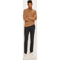 Tommy Hilfiger - Spodnie. Czarne spodnie męskie TOMMY HILFIGER, na co dzień, z haftami, z bawełny. W wyprzedaży za 399,90 zł.