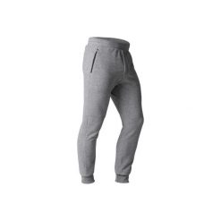 Spodnie dresowe slim Gym & Pilates 500 zip męskie. Szare spodnie męskie DOMYOS, m, bez wzorów, z elastanu. Za 59,99 zł.