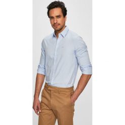 Armani Exchange - Koszula. Białe koszule męskie Armani Exchange, xl, bez wzorów, z bawełny, klasyczne, z klasycznym kołnierzykiem, z długim rękawem. Za 349,90 zł.