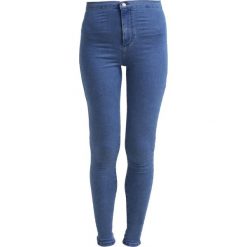 Topshop JONI NEW Jeans Skinny Fit mid denim. Niebieskie jeansy damskie marki Topshop, z elastanu. Za 209,00 zł.
