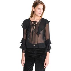 Guess Thelma Bluzka Czarny. Czarne bluzki damskie Guess, xs, z aplikacjami, z poliesteru, bez kołnierzyka, bez rękawów. Za 404,95 zł.