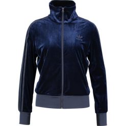 Adidas Originals FIREBIRD Kurtka sportowa dark blue. Niebieskie kurtki damskie adidas Originals, z elastanu. W wyprzedaży za 239,20 zł.
