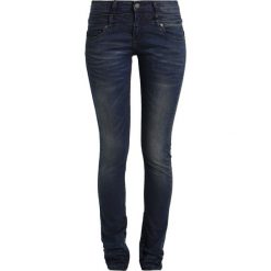 Circle of Trust DNIMES Jeansy Slim fit dark blue. Niebieskie rurki damskie marki Circle of Trust, z elastanu. W wyprzedaży za 284,25 zł.