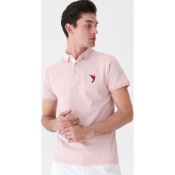 Koszulka polo z haftem - Różowy. Różowe koszulki męskie House, s, z haftami, bez rękawów. Za 49,99 zł.