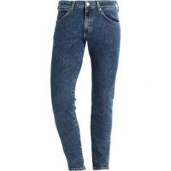 Rurki męskie: Wrangler STRANGLER Jeans Skinny Fit stonewash