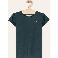 Tommy Hilfiger - T-shirt dziecięcy 110-176 cm. Białe bluzki dziewczęce TOMMY HILFIGER, bez wzorów, z bawełny, z okrągłym kołnierzem, z krótkim rękawem, krótkie, bez kaptura. Za 119,90 zł.