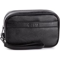 Saszetka GUESS - City HM6720 POL93 BLA. Czarne torby męskie skórzane Guess, z aplikacjami, ze skóry ekologicznej, młodzieżowe. Za 299,00 zł.