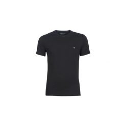 T-shirty z krótkim rękawem Guess CORE. Czarne t-shirty męskie marki Guess, s, z aplikacjami, bez kołnierzyka, krótkie. Za 109,00 zł.