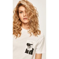 Karl Lagerfeld - T-shirt. Białe bluzki damskie KARL LAGERFELD, s, z nadrukiem, z bawełny, z okrągłym kołnierzem, z krótkim rękawem. W wyprzedaży za 319,90 zł.
